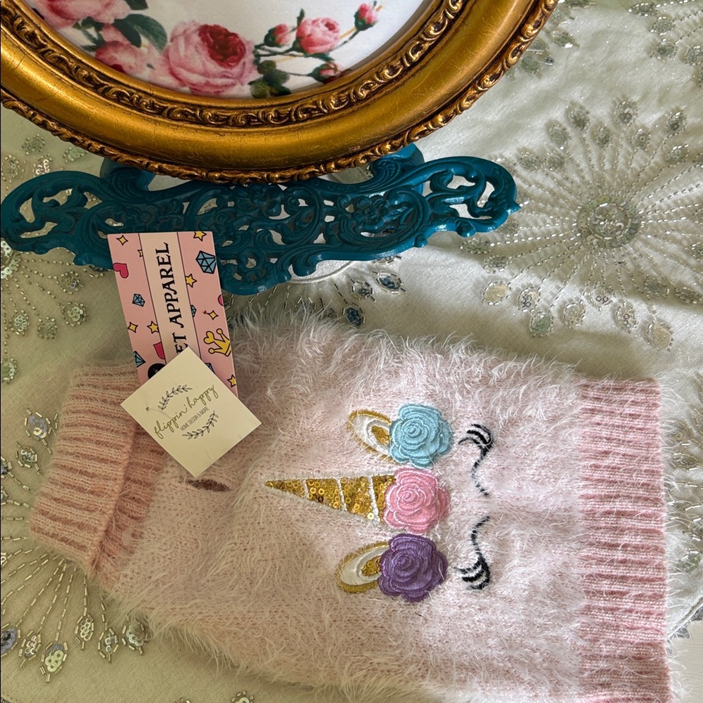 Fluffy Pink Sweater with Unicorn Design